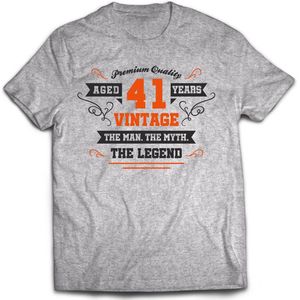 41 Jaar Legend - Feest kado T-Shirt Heren / Dames - Antraciet Grijs / Oranje - Perfect Verjaardag Cadeau Shirt - grappige Spreuken, Zinnen en Teksten. Maat L