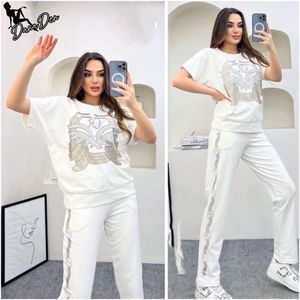 Dames Loungewear - Witte 2-delige Pyjama Set - T-shirt met Strass Details - Lange Broek