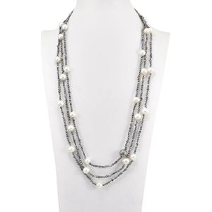 Proud Pearls® Extra lange parelketting met grote ronde parels en zilveren ornament.