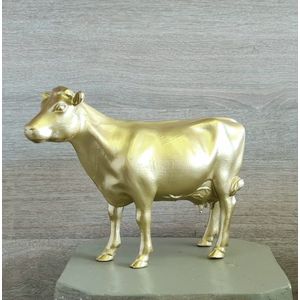 Beeldje gouden koe