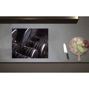 Inductieplaat Beschermer - Foto van Rek Vol Dumbells in Sportschool - 60x52 cm - 2 mm Dik - Inductie Beschermer van Vinyl