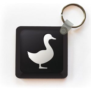 Sleutelhanger - Uitdeelcadeautjes - Een illustratie van een eend op een zwarte achtergrond - Plastic