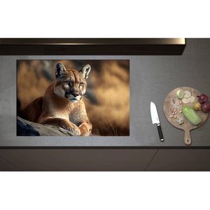 Inductieplaat Beschermer - Cartoon van Puma Liggend op Grijze Rots in Natuurgebied - 80x55 cm - 2 mm Dik - Inductie Beschermer - Bescherming Inductiekookplaat - Kookplaat Beschermer van Wit Vinyl