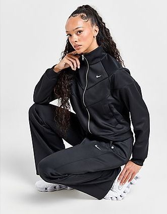 Nike - Sportswear Windrunner - Aansluitende Knit Damesbroek - Blauw - Halfhoge Taille