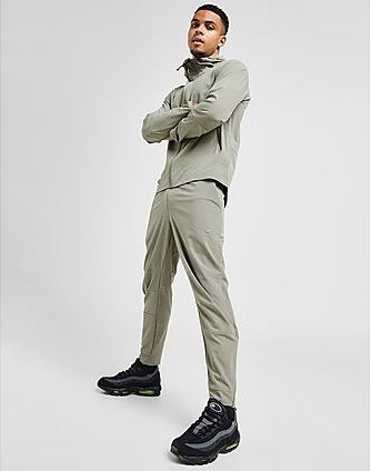 Nike - Unlimited Dri-FIT - Sportbroek - Zwart - Taps Toelopend, Ritszakken, Elastische Tailleband