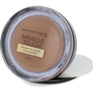 Max Factor Miracle Touch Foundation 83 Golden Tan - SPF 30 en hyaluronzuur