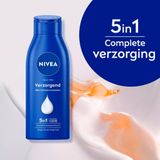 NIVEA Verzorgende Bodymilk - Body Care - 48 uur hydratatie - Bevat Amandelolie en Vitamine E - 400 ml