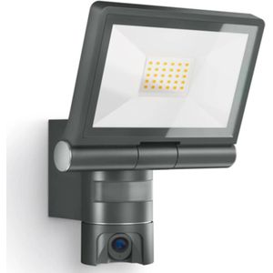 <p>Deze moderne Steinel tuinspotlight met sensor XLED CAM 1 is perfect voor ingangen, gevels, patio's, enz. De sensorlamp is zacht voor de ogen en gaat automatisch aan en uit.</p>
<p>De tuinspotlight is voorzien van een bewegingsmelder en een fotocel controller. Door de glazen lampenkap straalt de LED-lamp gelijkmatig licht uit waardoor er een fijne sfeer ontstaat.</p>
<p>Naast een 180° infraroodsensor heeft de lamp een geïntegreerd intercomsysteem waardoor je direct contact kunt maken en kunt communiceren met de bezoeker. Indien ingesteld ontvang je een notificatie op je telefoon of tablet.</p>
<p>De gratis app is verkrijgbaar voor iOS en Android. Gemak, veiligheid en energie-efficiëntie in dezelfde lamp? Steinel maakt het mogelijk.</p>
<p>De sensortuinlamp is ongelooflijk eenvoudig te installeren en de functie-instellingen van het product zijn gemakkelijk te begrijpen.</p>
<ul>
  <li>Kleur: zwart</li>
  <li>Materiaal: aluminium en glas</li>
  <li>Afmetingen: 167 x 210 x 275 mm (L x B x H)</li>
  <li>Voeding: 220 - 240 V~, 50 - 60 Hz</li>
  <li>Montagehoogte (max.): 2 m</li>
  <li>Sensortechnologie: passief infrarood</li>
  <li>Vermogen: 21 W</li>
  <li>Lichtstroom: 2.200 lm</li>
  <li>Kleurtemperatuur: 3.000 K</li>
  <li>Kleurvariatie LED: SDCM3</li>
  <li>Kleurweergave-index: CRI 80 - 89</li>
  <li>Levensduur LED: 50.000 uur</li>
  <li>Lichtstroomafname conform LM80 L70B10</li>
  <li>Koelsysteem LED: Passieve Thermo Control</li>
  <li>Met bewegingssensor</li>
  <li>Detectiehoek: 180°</li>
  <li>Openingshoek: 45°</li>
  <li>Mogelijkheid van het maskeren van afzonderlijke onderdelen</li>
  <li>Fotocelcontroller</li>
  <li>Schemerinstelling: 10 - 10.000 lx</li>
  <li>Tijdsinstelling: 60 seconden - 15 minuten</li>
  <li>Basislichtniveaufunctie</li>
  <li>Begint met zacht licht</li>
  <li>IP-beschermingsklasse: IP44</li>
  <li>Slagvastheid: IK03</li>
  <li>Beschermingsklasse: I</li>
  <li>Omgevingstemperatuur: -10 - +40 °C</li>
  <li>Met HD-kleurencamera met brede hoek</li>
  <li>Met micro-SD-kaart (8 GB, inbegrepen)</li>
  <li>Instelbaar nachtlicht in het donker (0 - 40%)</li>
</ul>