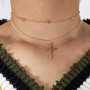 Ketting met kruisje + Ketting fantasy goudkleur