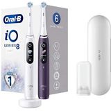 Oral-B Set van 2 iO 8 elektrische tandenborstels, wit/paars, 2 stuks