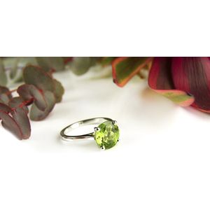 wit gouden solitair ring met peridoot