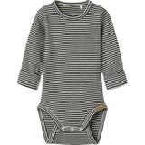 Boxpakje - O-hals - Lange Mouwen - Knoop Detail