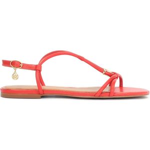 Red sandals on a flat sole with an overhang