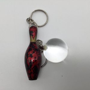 Bowling Bowling sleutelhanger 'Combi pin en bal massief'  donker rood  en doorzichtig wit