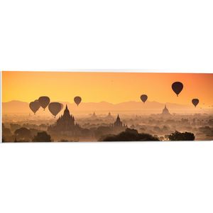 WallClassics - PVC Schuimplaat- Luchtballonnen boven Tempels met Zonsondergang - 90x30 cm Foto op PVC Schuimplaat