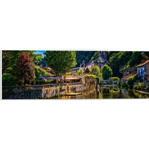 PVC Schuimplaat - Rivier - Bootje - Mensen - Water - Bomen - Bloemen - Planten - Terras - Gebouw - 60x20 cm Foto op PVC Schuimplaat (Met Ophangsysteem)