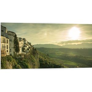WallClassics - PVC Schuimplaat- Dorp aan de Rand van de Klif - 100x50 cm Foto op PVC Schuimplaat