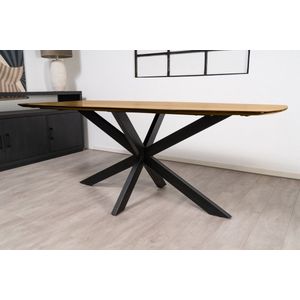 Floor tafel met gecurved Mango houten blad van 180 x 90 cm met facetrand aan onderzijde. Bladkleur naturel glad afgewerkt. Onderstel is een spinpoot in de kleur zwart.