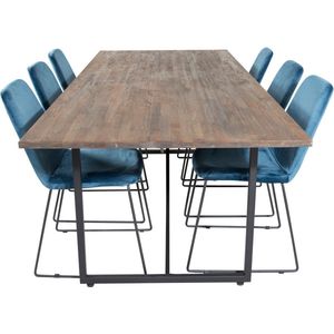 Padang eethoek eetkamertafel teakhout en 6 Muce eetkamerstal velours blauw.