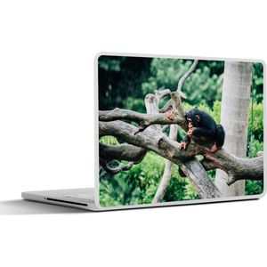 Laptop sticker - 13.3 inch - Jonge chimpansee in de jungle - 31x22,5cm - Laptopstickers - Laptop skin - Cover
