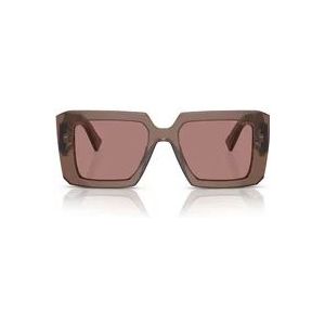 Prada PR23YS 17O60B bruin transparante lichtbruine zonnebril