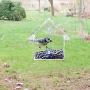 <p>Wilt u graag weten wat er zich afspeelt in een vogelvoederhuisje? Dan is dit moderne acryl voederhuisje van Esschert design perfect voor u. Met zijn doorzichtige muren en dak kunt u alles wat er binnen gebeurt gemakkelijk observeren.</p>
<p>Het voederhuisje kan eenvoudig op het raam worden geplaatst dankzij de 2 zuignappen. Het transparante materiaal zorgt ervoor dat u kunt genieten van het schouwspel van vogels die van het eten genieten. Bovendien is het materiaal makkelijk schoon te maken.</p>
<p>Dit voederhuisje wordt geleverd in een cadeauverpakking en bevat 2 zuignappen voor bevestiging op een raam of muur. Let op: vogelvoer is niet inbegrepen.</p>
<ul>
  <li>Kleur: doorzichtig</li>
  <li>Materiaal: PMMA en PVC</li>
  <li>Afmetingen: 15 x 10 x 15,3 cm (L x B x H)</li>
  <li>Inclusief 2 zuignappen voor bevestiging op een raam</li>
  <li>Eenvoudig te reinigen</li>
  <li>Voer is niet inbegrepen</li>
</ul>