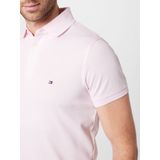 Slim polo slim in stretch piquétricot TOMMY HILFIGER. Katoen materiaal. Maten XS. Roze kleur