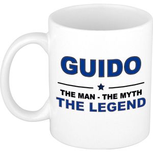 Naam cadeau Guido - The man, The myth the legend koffie mok / beker 300 ml - naam/namen mokken - Cadeau voor o.a verjaardag/ vaderdag/ pensioen/ geslaagd/ bedankt