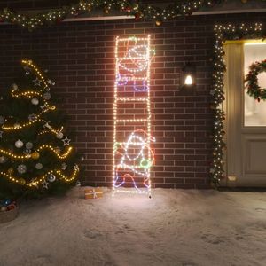 vidaXL - Kerstfiguur - kerstman - op - ladder - opvouwbaar - 552 - LED's - 50x200 - cm