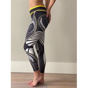 Ultimate Fit Fitnesslegging met abstract blad design in zwart, wit en gele kleurcombinatie