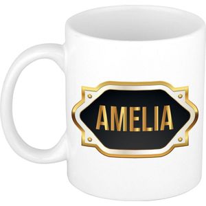 Amelia naam cadeau mok / beker met gouden embleem - kado verjaardag/ moeder/ pensioen/ geslaagd/ bedankt