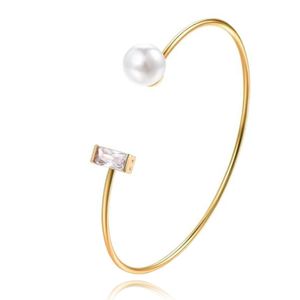 Goudkleurige armband met Rechthoekige Zirkonia Steen en Imitatie Parel