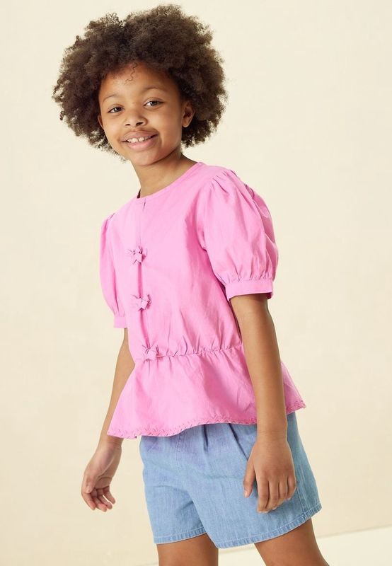 Roze blouse met striksluiting