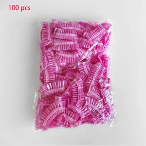 100 Wegwerp douchemutsen - Plastic Badmuts - douchemuts - 100 stuks - Roze