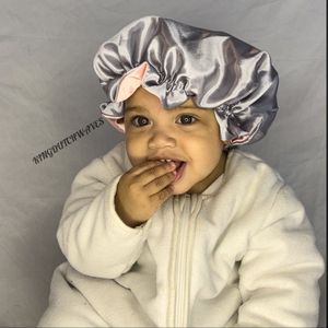 satijnen bonnet Ghana