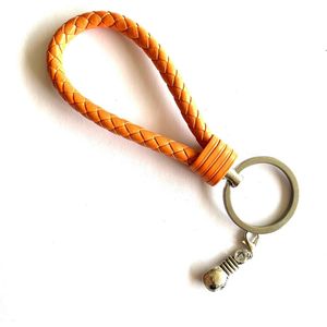 Sleutelhanger - Oranje - Boksen - Judo - Karate - Fitness - Sport - Hanger - Leer - Kickboksen - Bokshandschoen - Kleur - Sportsieraad - Sieraad - Sportsieraden - Sieraden - Team - Teamkado