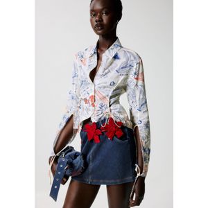 Bedrukte blouse met strikjes