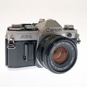 Canon AE-1 + Canon FD 50mm f/1.8 - Tweedehands