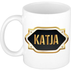 Katja naam cadeau mok / beker met gouden embleem - kado verjaardag/ moeder/ pensioen/ geslaagd/ bedankt