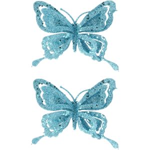 10x stuks decoratie vlinders op clip glitter ijsblauw 14 cm - Bruiloftversiering/kerstversiering decoratievlinders