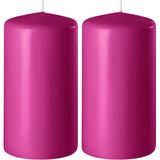 2x Fuchsia roze cilinderkaarsen/stompkaarsen 6 x 8 cm 27 branduren - Geurloze kaarsen fuchsia roze - Woondecoraties
