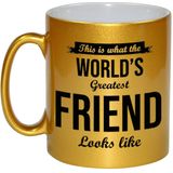 This is what the worlds greatest friend looks like cadeau koffiemok / theebeker - goudkleurig - 330 ml - verjaardag / bedankje / cadeau - tekst mokken