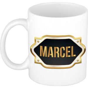 Marcel naam cadeau mok / beker met gouden embleem - kado verjaardag/ vaderdag/ pensioen/ geslaagd/ bedankt