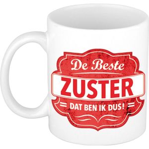 De beste zuster cadeau koffiemok / theebeker wit met rood embleem - 300 ml - keramiek - cadeaumok zuster / verpleegster / nurse