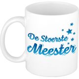 De stoerste meester mok / beker wit met blauwe tekst - 300 ml - verjaardag / bedankt cadeau leraar / docent